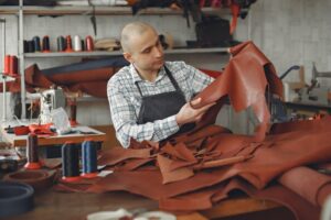 A leather production planner in a workshop